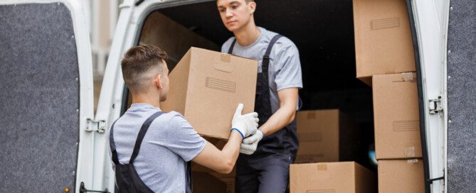 mover handing off moving box